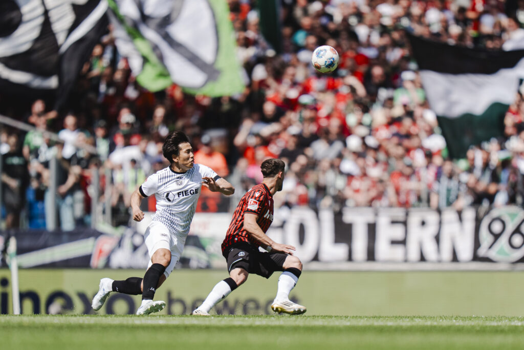 Shin Yamada in action for Preussen Munster against Hannover 96 in 2. Bundesliga