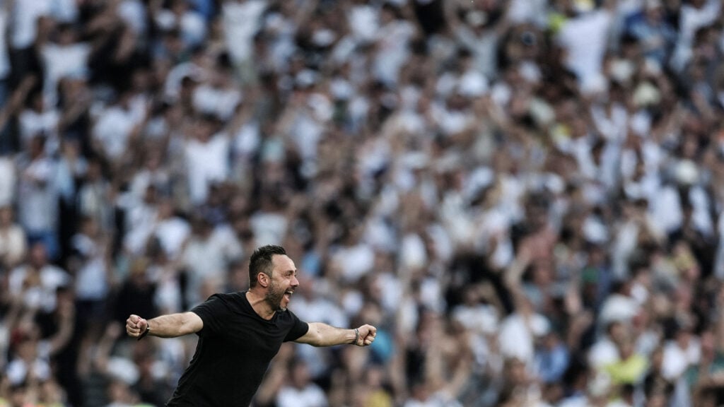 Roberto De Zerbi celebrates after Tottenham Hotspur survive Premier League relegation after beating Everton.